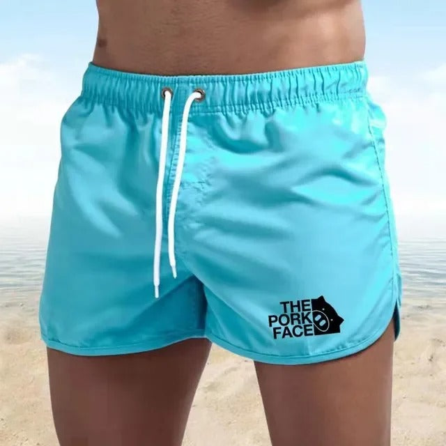 Adam - Atmungsaktive, tief ausgeschnittene Herren Badeshorts für den Strand