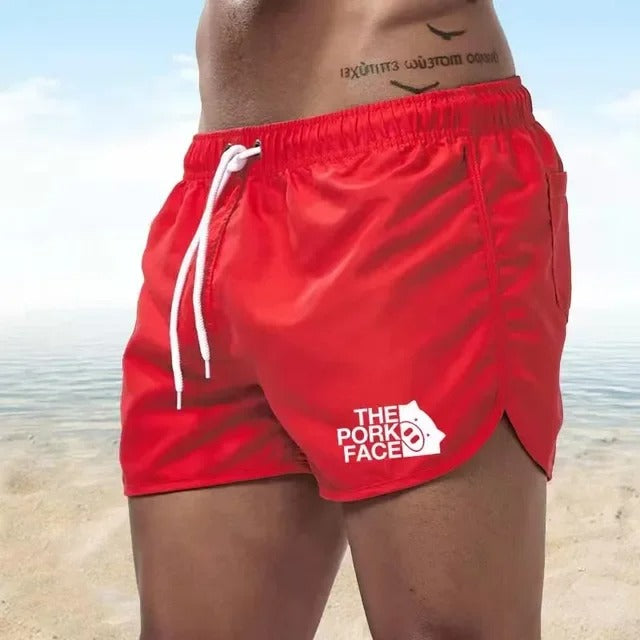 Adam - Atmungsaktive, tief ausgeschnittene Herren Badeshorts für den Strand