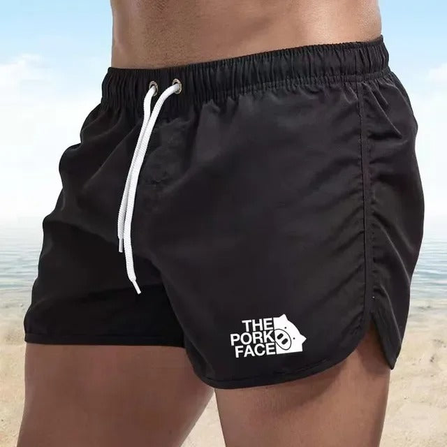 Adam - Atmungsaktive, tief ausgeschnittene Herren Badeshorts für den Strand