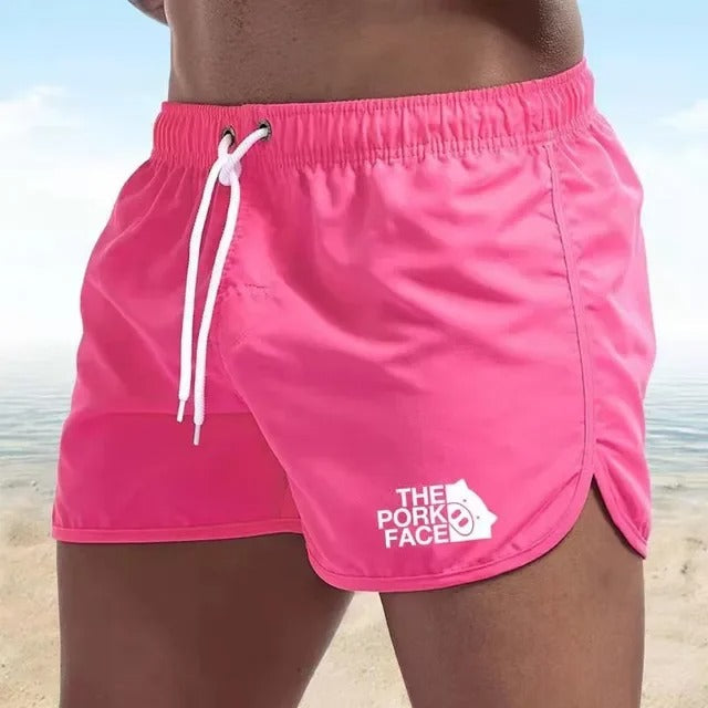 Adam - Atmungsaktive, tief ausgeschnittene Herren Badeshorts für den Strand