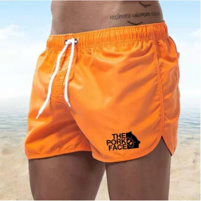 Adam - Atmungsaktive, tief ausgeschnittene Herren Badeshorts für den Strand